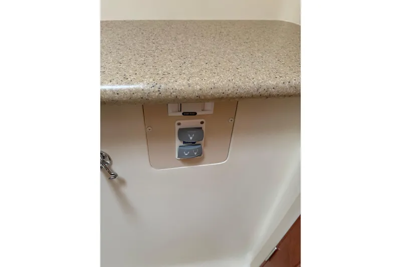 Slide: The Image of Control panel on 2009 Hunter 41 Deck Salon yacht with beige countertop. - 81