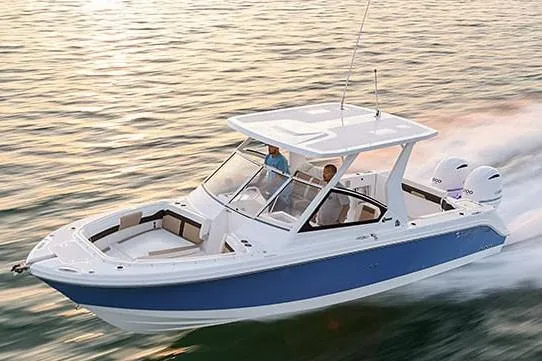 Slide: The Image of Manufacturer Provided Image: 2026 Edgewater 262CX Crossover boat cruising on water at high speed. - 1