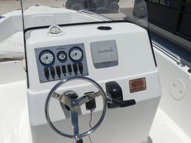 Slide: The Image of Dashboard of a 2018 Release 180 RX boat with Garmin system. - 13
