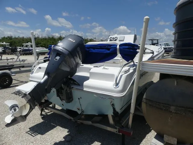Slide: The Image of 2018 Release 180 RX boat with outboard motor on trailer. - 4