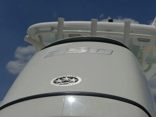 Slide: The Image of Close-up of a 2019 Sea Born LX24 Center Console boat engine. - 11