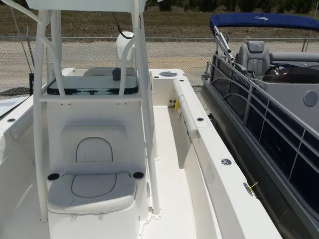 Slide: The Image of 2019 Sea Born LX24 Center Console boat at dock. - 15
