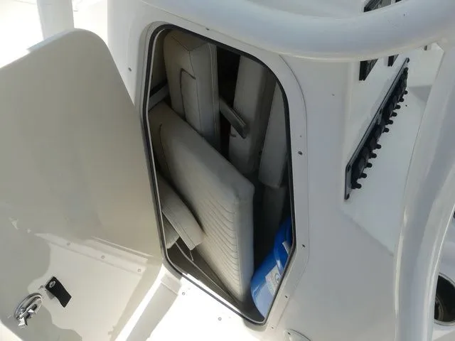Slide: The Image of Storage compartment in 2019 Sea Born LX24 Center Console boat. - 16