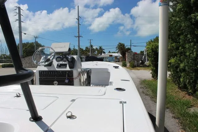 Slide: The Image of 2005 Action Craft 1890 Flatmaster boat on trailer, sunny day. - 10