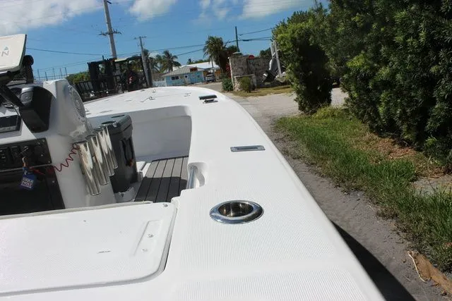 Slide: The Image of 2005 Action Craft 1890 Flatmaster boat on a sunny day. - 11