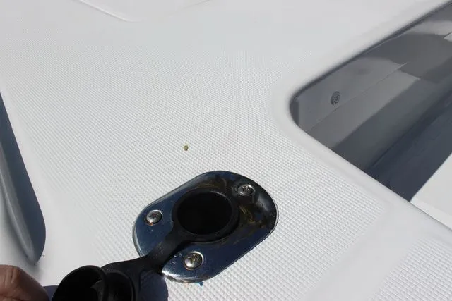 Slide: The Image of Close-up of a 2005 Action Craft 1890 Flatmaster boat deck. - 22
