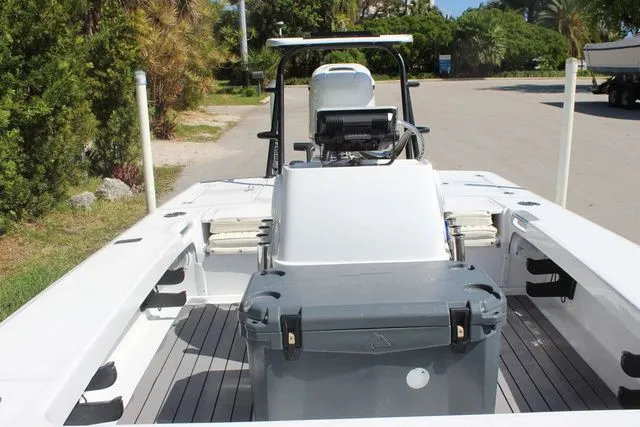 Slide: The Image of 2005 Action Craft 1890 Flatmaster boat with console and storage. - 24