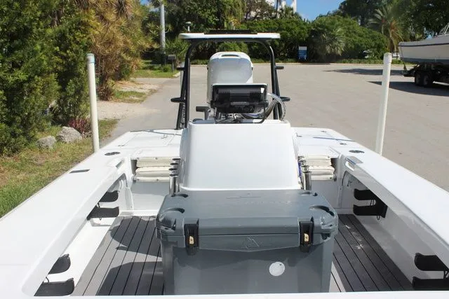 Slide: The Image of 2005 Action Craft 1890 Flatmaster boat on parking lot. - 25