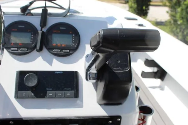 Slide: The Image of Control console of a 2005 Action Craft 1890 Flatmaster boat. - 31