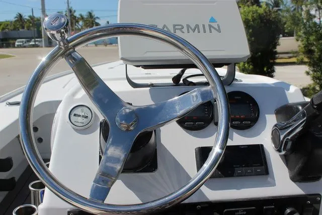 Slide: The Image of Steering console of a 2005 Action Craft 1890 Flatmaster boat. - 32