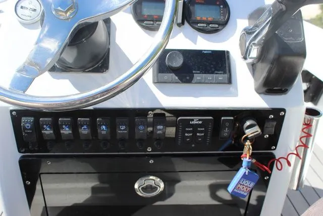 Slide: The Image of Console of a 2005 Action Craft 1890 Flatmaster boat. - 33