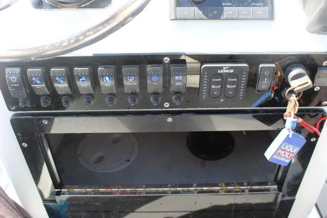 Slide: The Image of Dashboard of a 2005 Action Craft 1890 Flatmaster boat. - 34