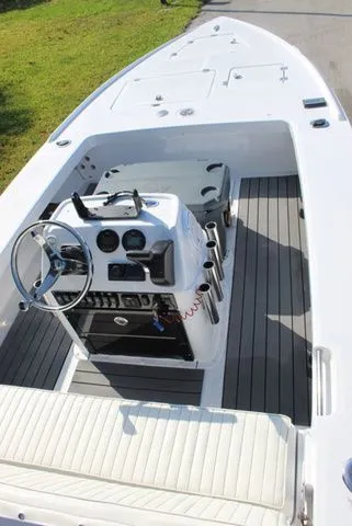 Slide: The Image of 2005 Action Craft 1890 Flatmaster boat interior, steering console and seating area. - 47