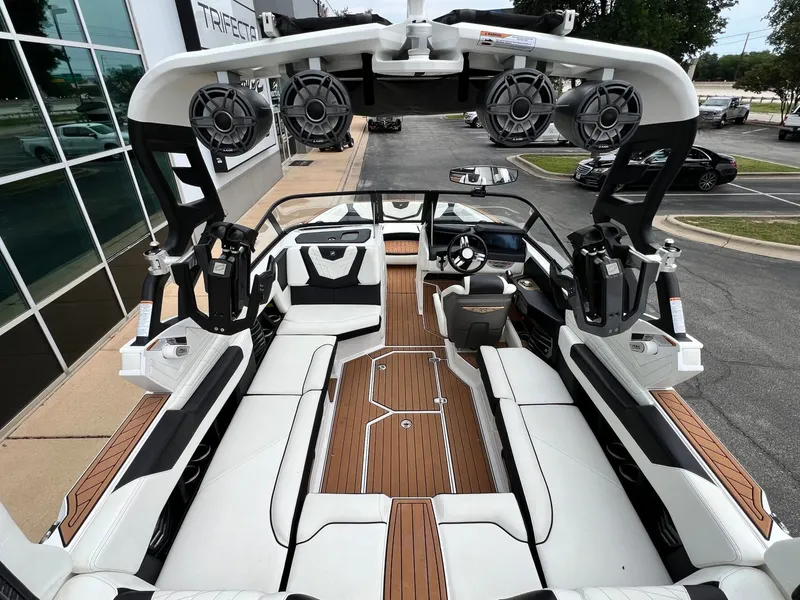 Slide: The Image of Interior view of a 2021 Nautique G23 boat with luxurious design. - 15