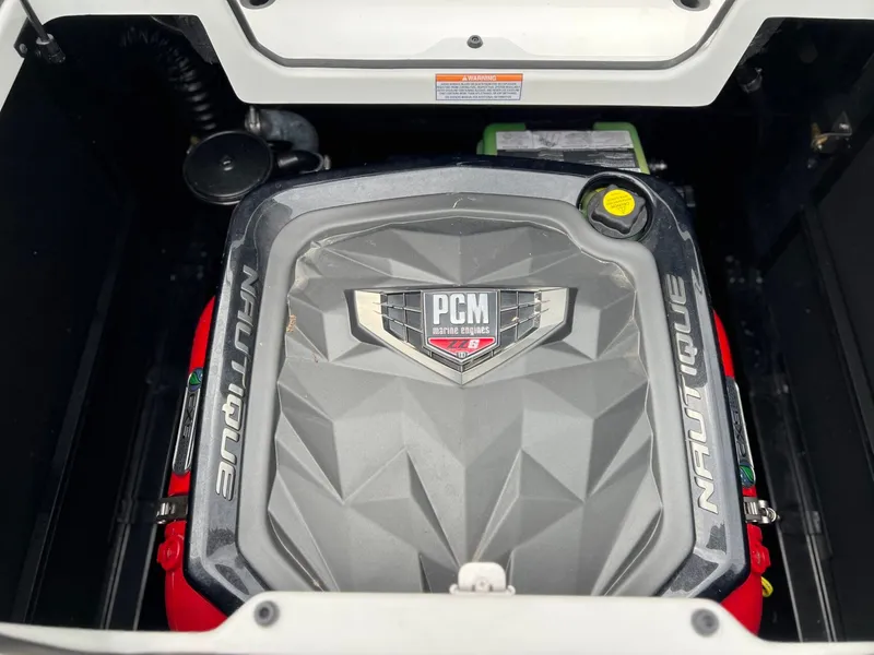 Slide: The Image of Engine compartment of 2021 Nautique G23 with PCM engine. - 16