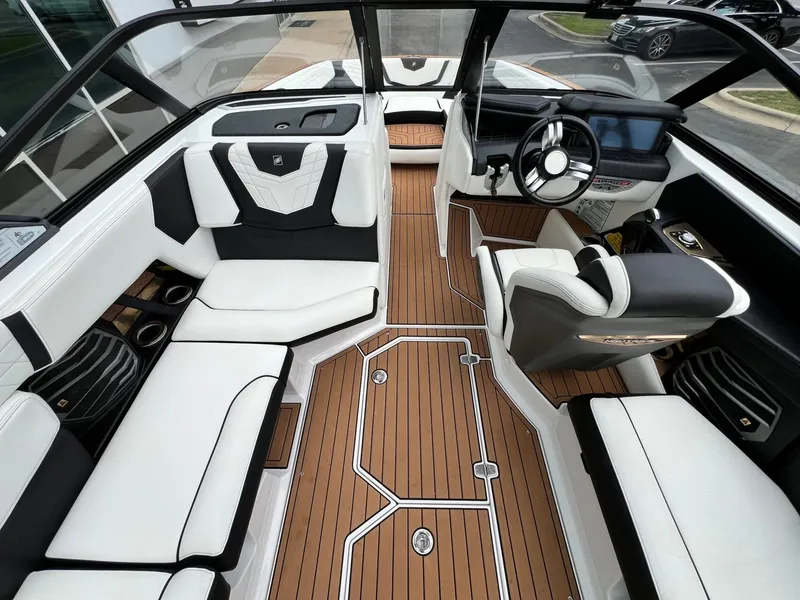 Slide: The Image of Interior of a 2021 Nautique G23 boat with luxurious design. - 20
