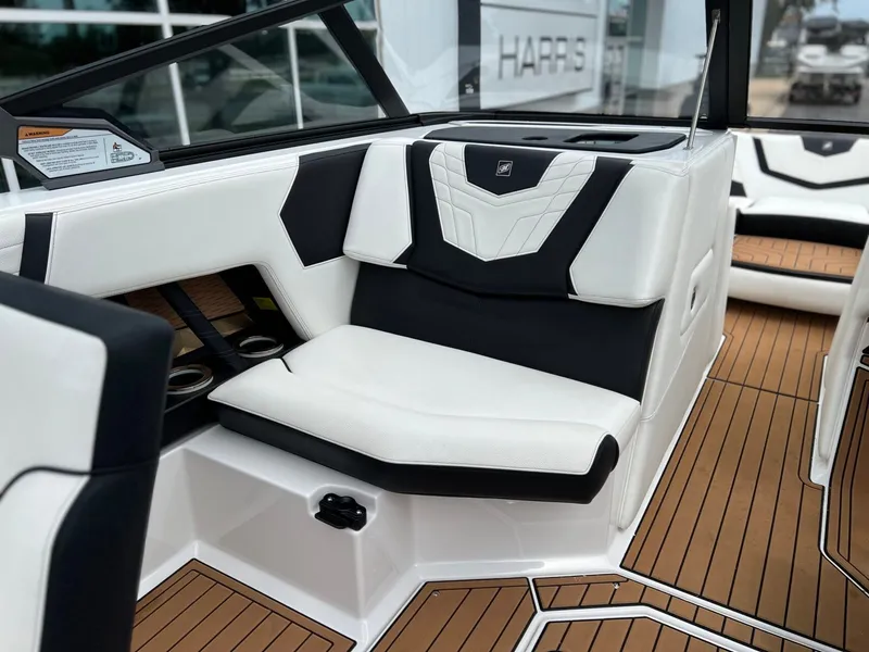 Slide: The Image of Interior of a 2021 Nautique G23 with luxurious seating. - 21