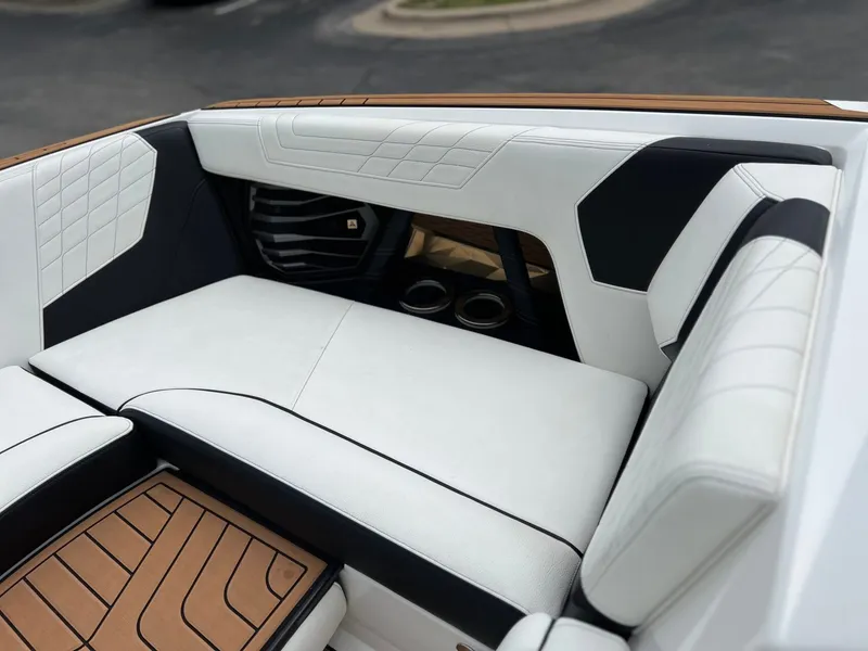 Slide: The Image of Interior of 2021 Nautique G23 with luxurious upholstery. - 30