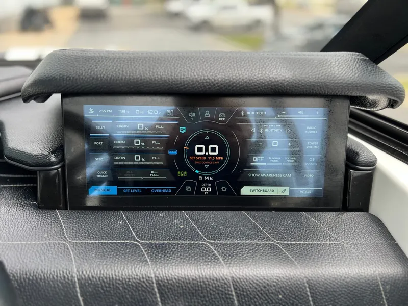 Slide: The Image of 2021 Nautique G23 boat display with control and performance data. - 33