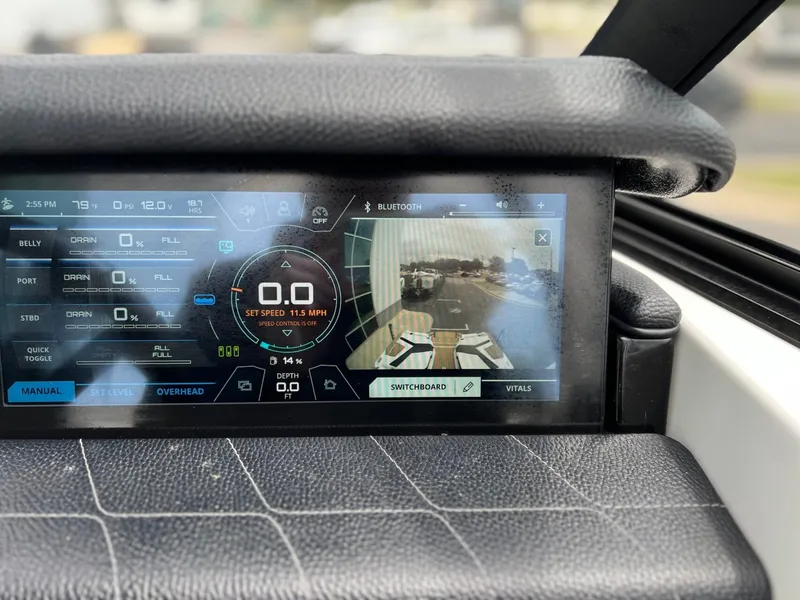 Slide: The Image of 2021 Nautique G23 boat display showing speed and control information. - 34