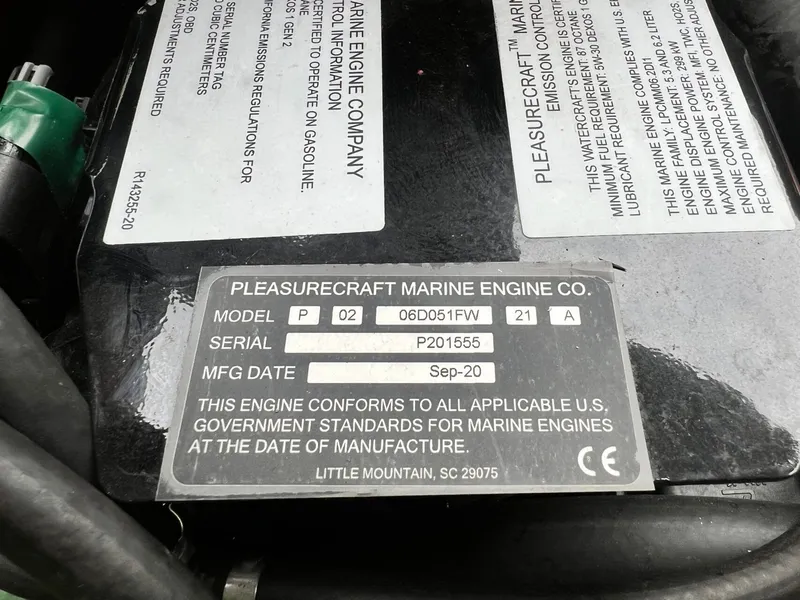 Slide: The Image of Pleasurecraft Marine Engine Co. label on 2021 Nautique G23. - 38