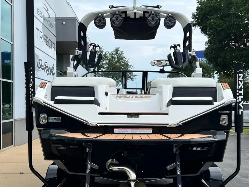 Slide: The Image of Rear view of a 2021 Nautique G23 boat at Next Level Marine. - 5