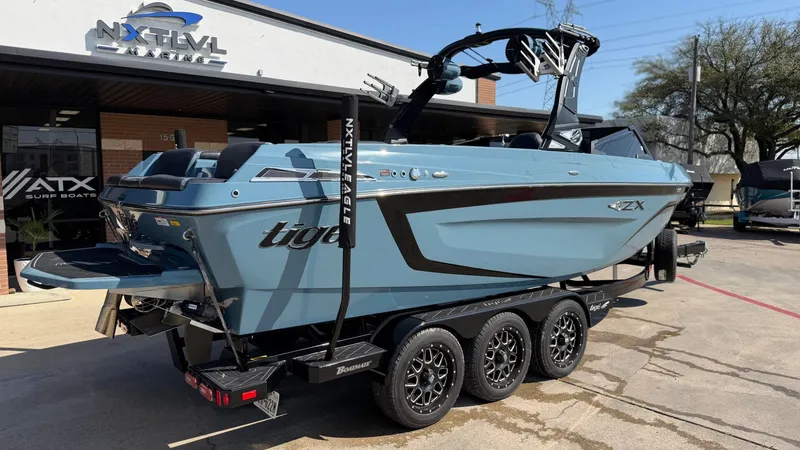 Slide: The Image of 2022 Tigé 25ZX boat at Next Level Marine. - 3