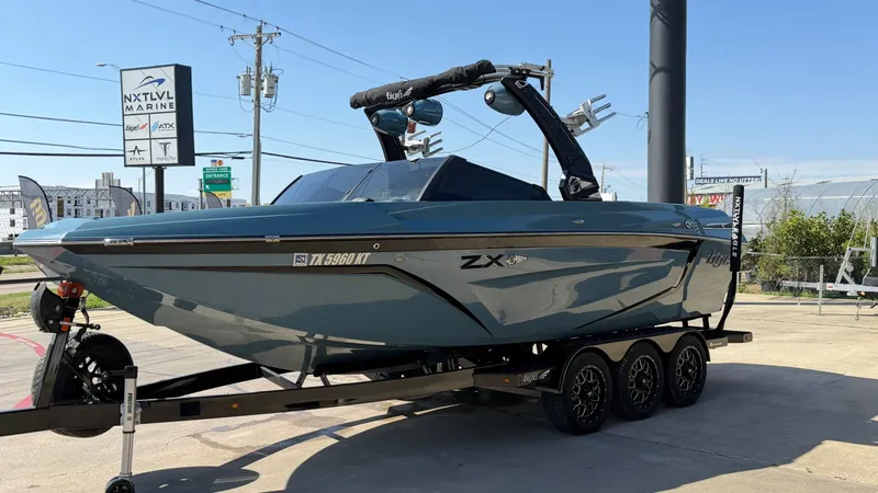 Slide: The Image of 2022 Tigé 25ZX boat on trailer at NXT LVL Marine. - 7