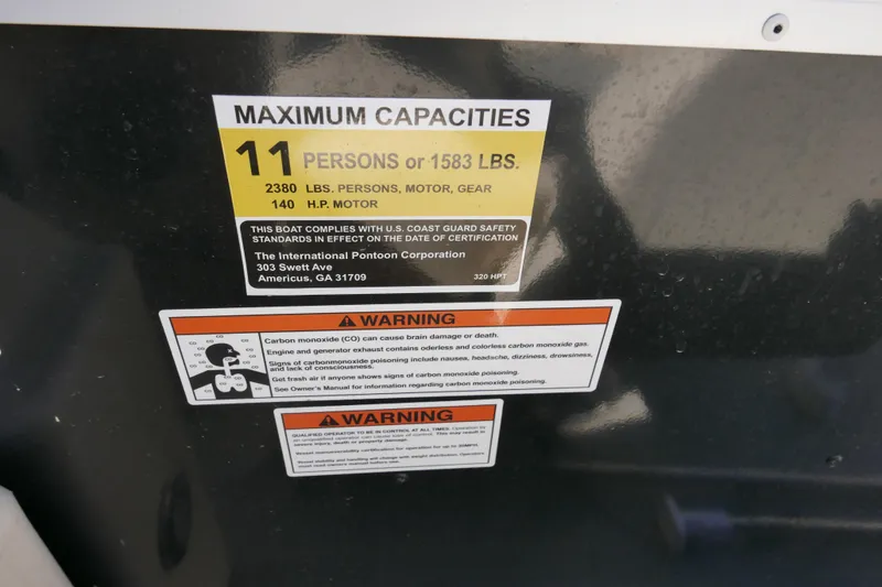 Slide: The Image of 2022 Lexington 320HPT capacity label: 11 persons, 1583 lbs, 140 HP motor warning. - 13