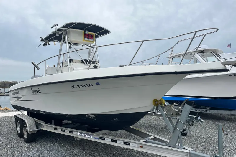 The Image of 2002 Hydra-Sports 230 CC boat on trailer, for sale, displayed outdoors. - 0