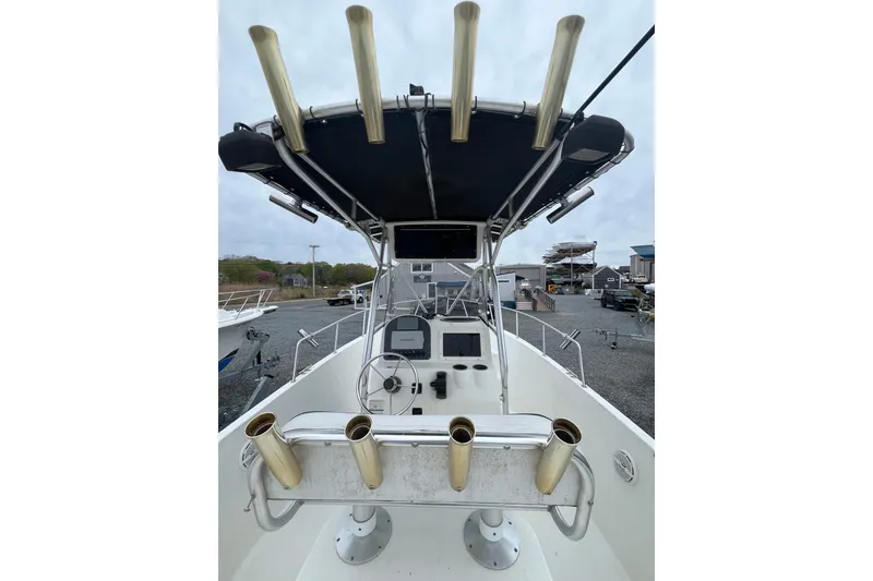Slide: The Image of 2002 Hydra-Sports 230 CC boat interior with rod holders and navigation equipment. - 6