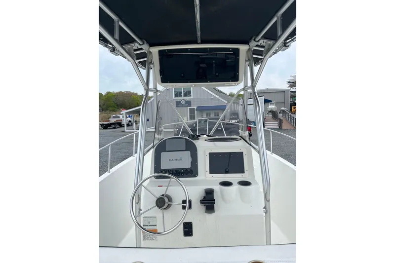 Slide: The Image of 2002 Hydra-Sports 230 CC boat console with Garmin navigation system and steering wheel. - 7