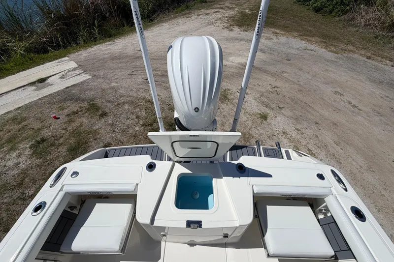 Slide: The Image of 2026 Pathfinder 2400 Open boat with seating and storage compartments, viewed from above. - 12