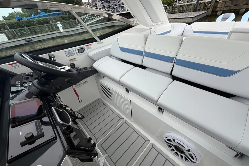 Slide: The Image of 2026 Formula 360 Crossover Bowrider OB interior with sleek helm and cushioned seating. - 42