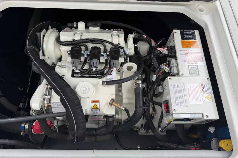 Slide: The Image of Engine compartment of 2026 Formula 360 Crossover Bowrider OB, showcasing detailed mechanical components. - 49