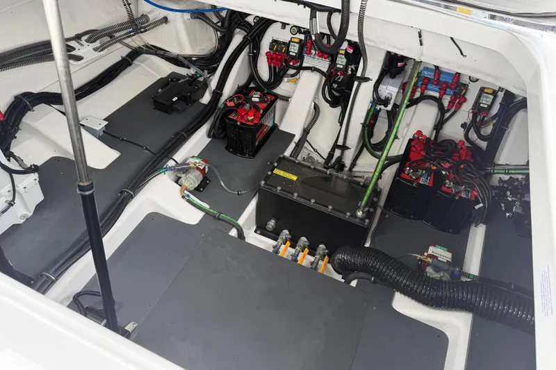 Slide: The Image of Engine compartment of 2026 Formula 360 Crossover Bowrider OB, showcasing wiring and battery systems. - 51
