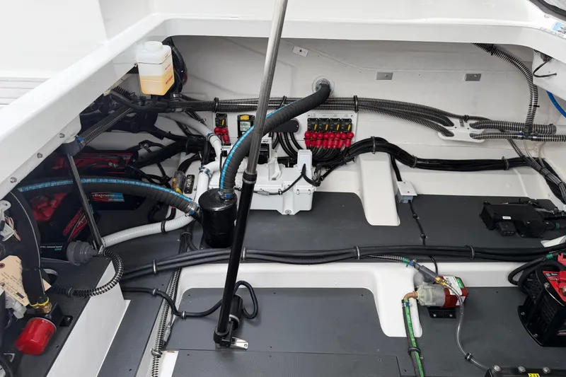 Slide: The Image of Engine compartment of 2026 Formula 360 Crossover Bowrider OB, showcasing wiring and components. - 52