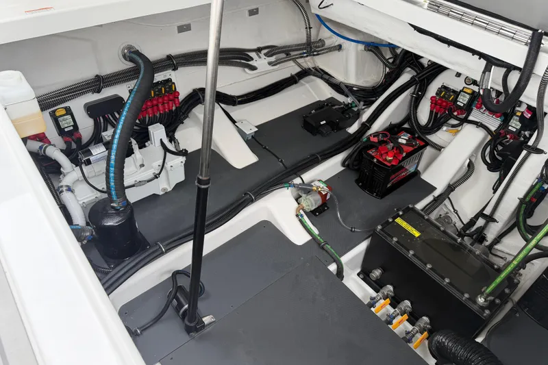 Slide: The Image of Engine compartment of 2026 Formula 360 Crossover Bowrider OB, showcasing wiring and components. - 54