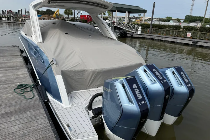 Slide: The Image of 2026 Formula 360 Crossover Bowrider OB with triple Mercury 425 engines docked. - 56