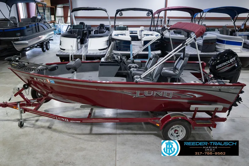 The Image of 2017 Lund 1650 Rebel XS SS boat on trailer in showroom. - 1