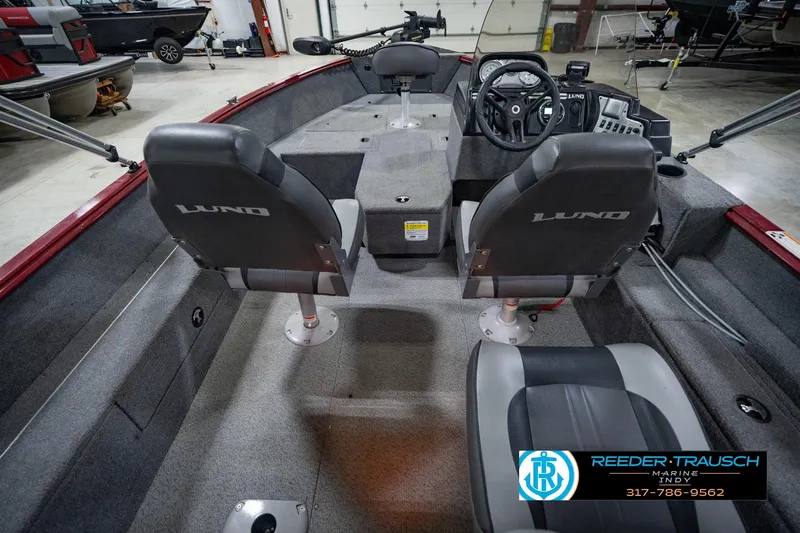Slide: The Image of 2017 Lund 1650 Rebel XS SS boat interior with steering console and seating. - 19
