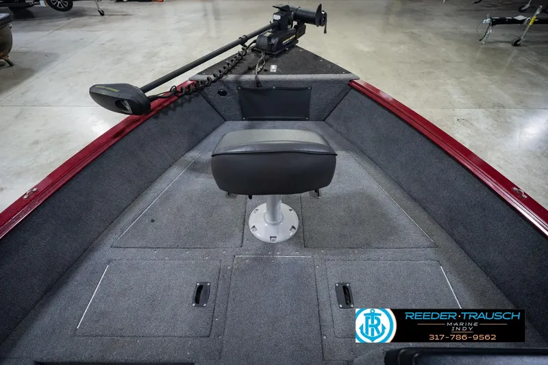 Slide: The Image of 2017 Lund 1650 Rebel XS SS boat interior with seat and trolling motor. - 22