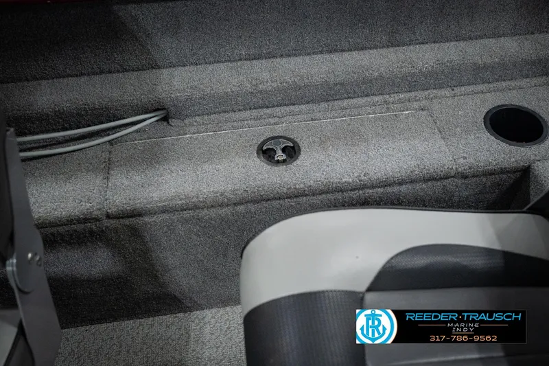 Slide: The Image of Interior of 2017 Lund 1650 Rebel XS SS boat with carpeted flooring and seating. - 34