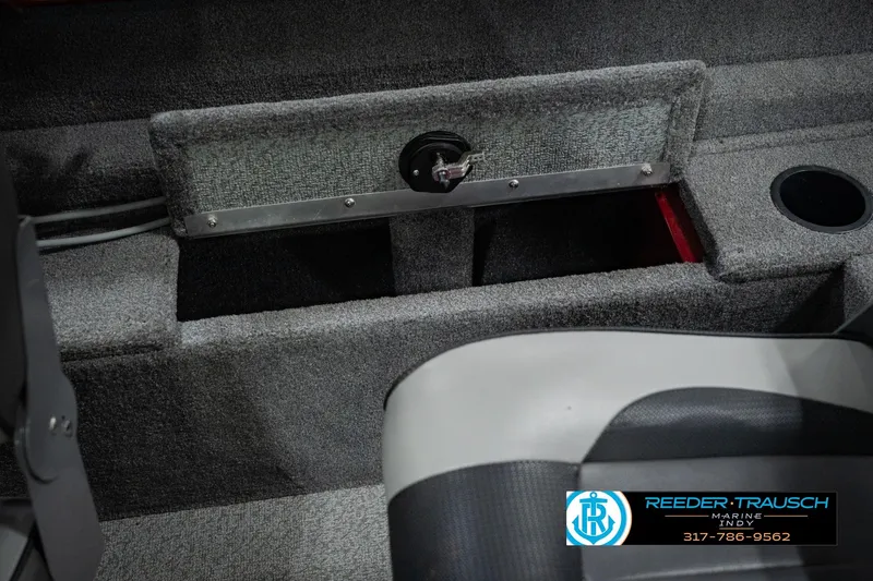 Slide: The Image of Interior of 2017 Lund 1650 Rebel XS SS boat showing storage compartment and seating. - 35