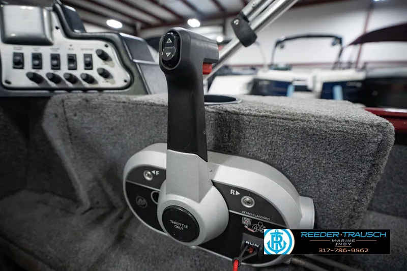 Slide: The Image of Control panel of a 2017 Lund 1650 Rebel XS SS boat with throttle lever. - 45