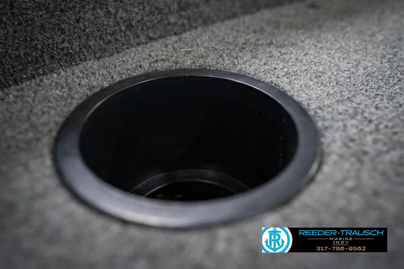 Slide: The Image of Cup holder in 2017 Lund 1650 Rebel XS SS boat, featuring carpeted interior. - 47