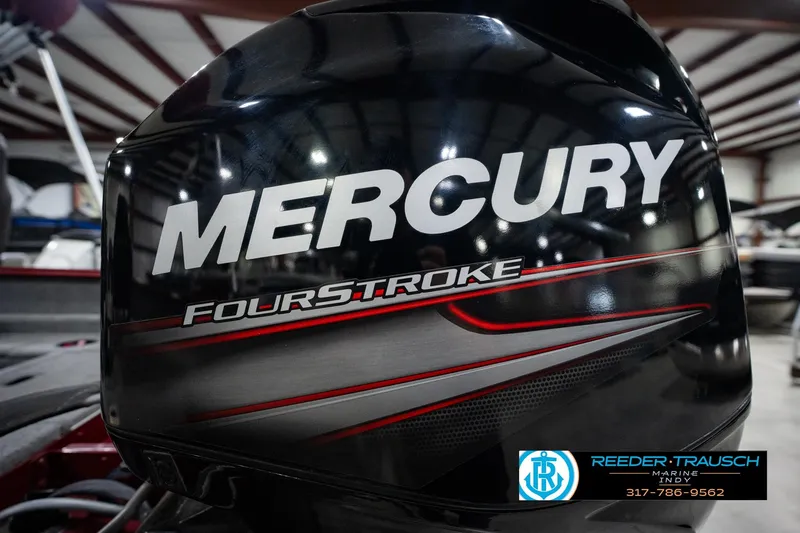Slide: The Image of Mercury FourStroke engine on a 2017 Lund 1650 Rebel XS SS boat, indoor setting. - 51