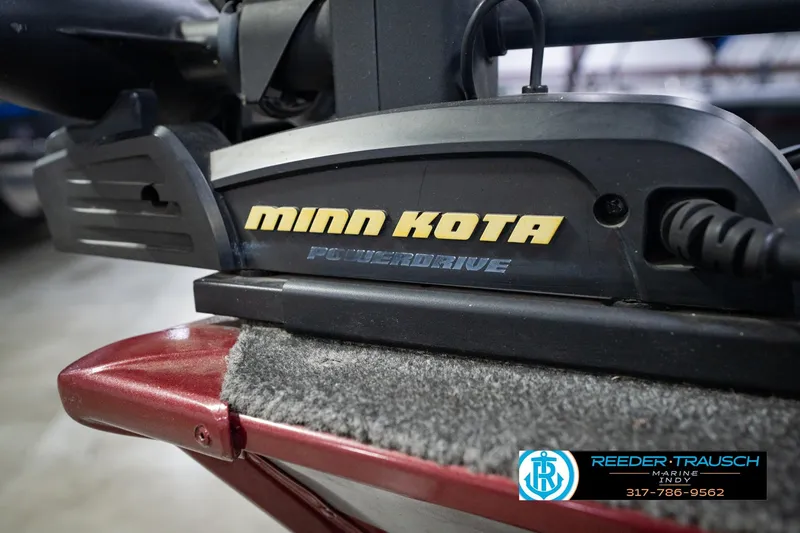 Slide: The Image of Minn Kota PowerDrive motor on 2017 Lund 1650 Rebel XS SS boat, Reeder-Trausch Marine logo visible. - 54