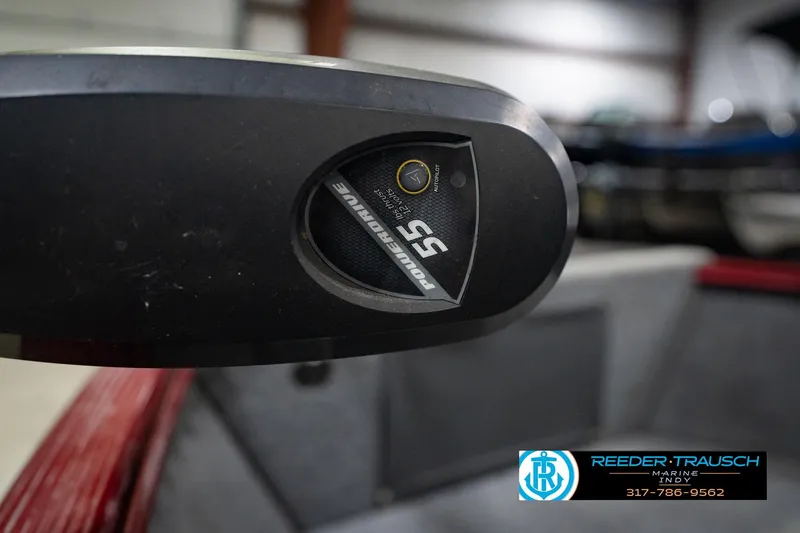 Slide: The Image of Close-up of a 2017 Lund 1650 Rebel XS SS boat component with PowerDrive 55 label. - 55