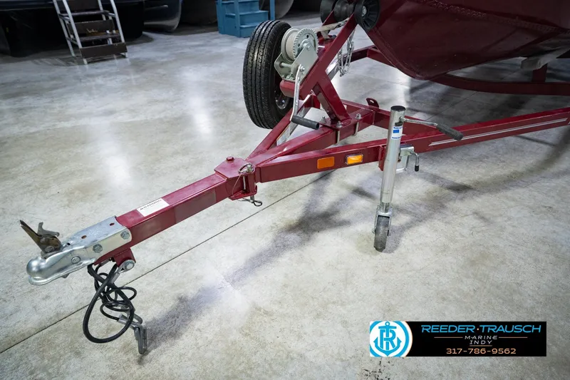 Slide: The Image of Trailer hitch of a 2017 Lund 1650 Rebel XS SS boat in a showroom. - 59